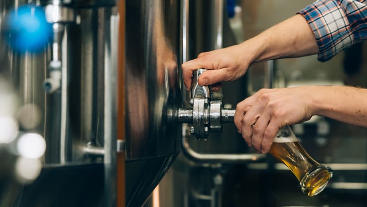 Beer being filled into a glass